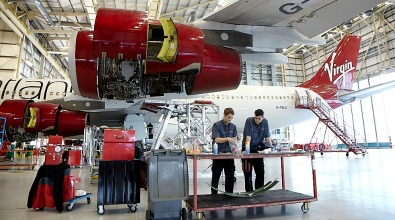 Engineers working on Virgin Atlantic aircraft
