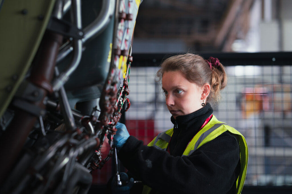 Female engineer working on Virgin Atlantic aircraft